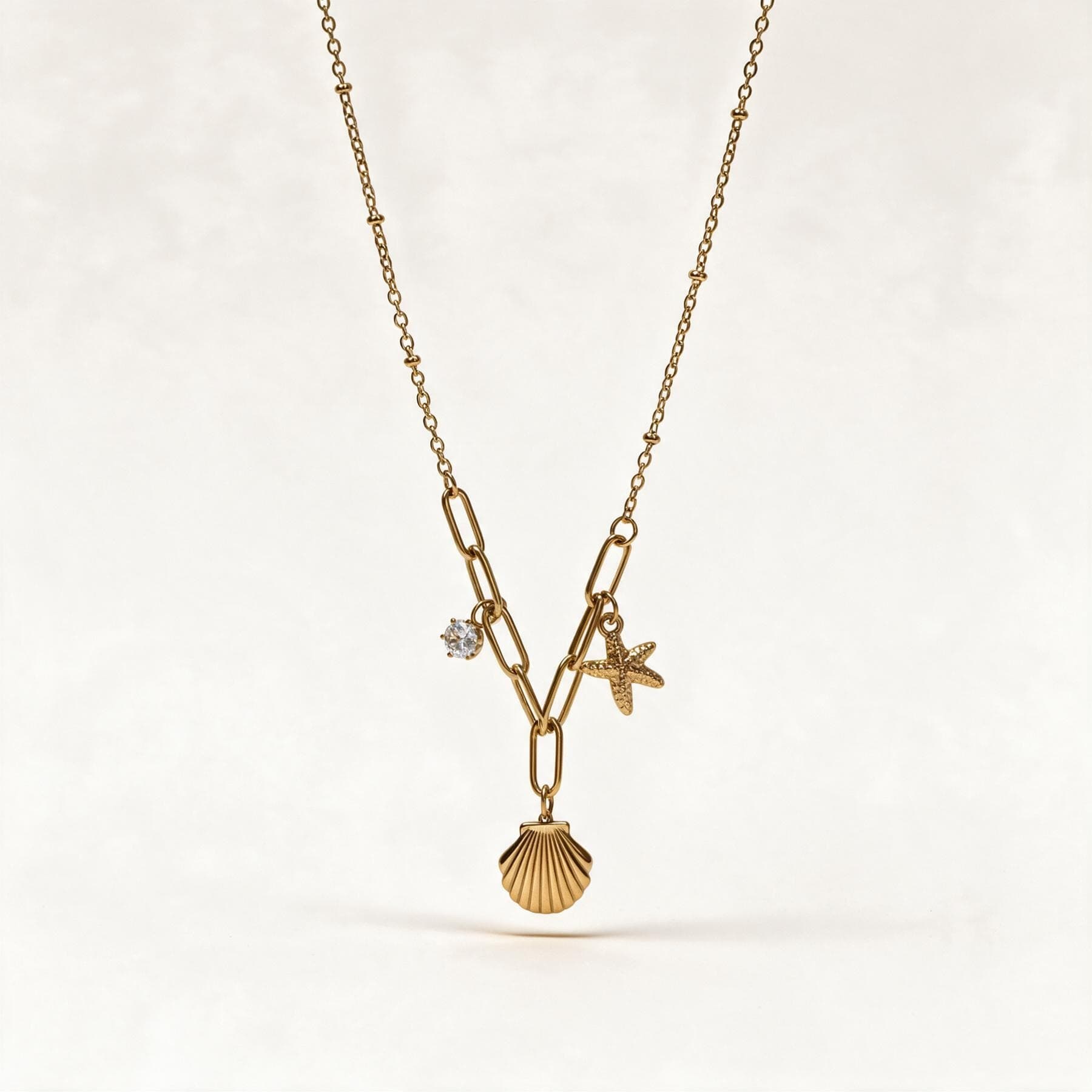 Gold Shell Starfish Charm Necklace — view 1 of 4
